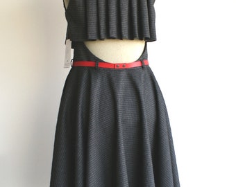 Dark grey dress, pleated back detail, circle skirt