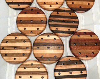Handmade trivets made from various domestic hardwoods