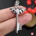 Larger One- Winged Key Stainless Steel Pendant