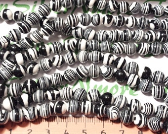 1 strand approx. 40 beads of 10mm Zebra Magnesite Beads