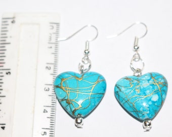 Mottled blue heart bead earrings