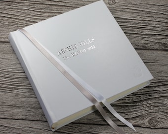 Personalised baby photo album in white leather with baby footprint and silver & white ribbon page marker - 9" x 8.75"