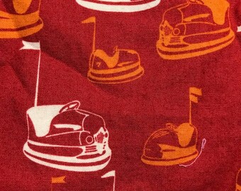 Half Yard Cotton Asbury designed by Thomas Knauer for Andover Fabrics Red Orange and white bumper cars fair circus penny arcade retro games