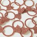 Rose gold engagement ring table confetti. Rose gold glitter wedding or engagement table decoration.