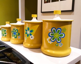 Vintage set of 60s Yellow Flower Power Groovy Metal Kitchen Canisters with Floral Motif