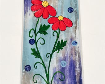 Daisies painted on aged wood