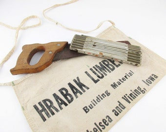 Vintage Carpenter's Apron From 'Hrabak Lumber Co.' With a 'Lufkin Red End' Wood Folding Ruler - Small Saw - Change Apron - Working