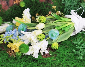 Bouquet of tulips, delphiniums and allium.