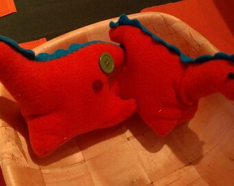Button dinosaur plushie