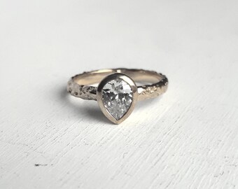 Rustic White Gold Moissanite Engagement Ring - Organic Textured Band - Teardrop Gemstone - Pear Bezel
