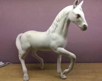 white porcelain horse statue