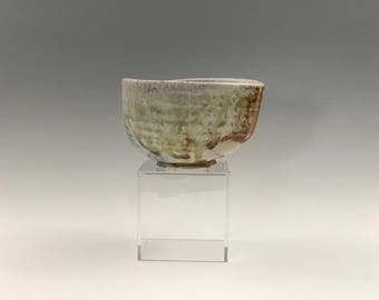 Wood fired porcelain matcha chawan, Japanese teabowl, anagama woodfired with shino and natural ash glazes. Pottery, ceramic, tea ceremony.