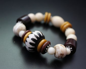 SALE Originally 58.00 Now 39.00 Boho stretch safari statement bracelet African bead bracelet Naga shell bracelet tagua nut jade bracelet