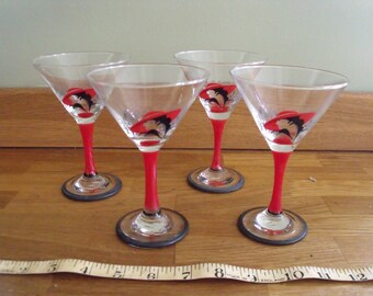Four Decorative Cocktail Glasses with 1930/40s lady and New York back drop