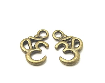 Packet 15 x Steampunk Antique Bronze Tibetan 16mm Ohm Charm/Pendant ZX08745
