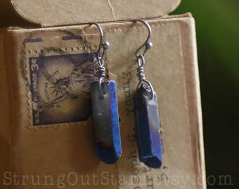 Strung-Out guitar string earrings with electric blue crystal points