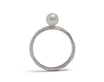Lunar tide pearl stacking ring