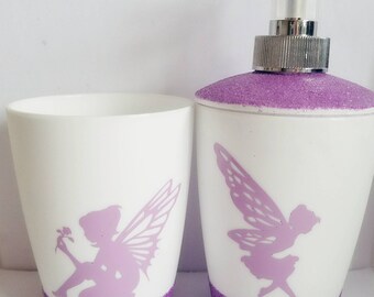 Pink fairies soap dispenser and toothbrush holder set