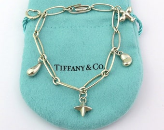 Authentic TIFFANY & CO Sterling Silver Elsa Peretti Five Charm Bracelet
