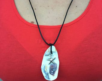 Unique oyster shell necklace with starfish charm