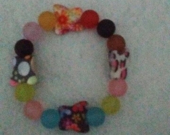 Butterfly and acrylic bead stretch bracelet
