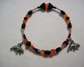 Reduced 10 per cent Orange, Blue & Black Memorywire Charm Bracelet