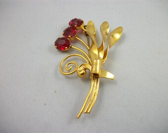 Antique Slovakian Gold Tone Brooch with French Clasp and Ruby Prong-set Rhinestones.