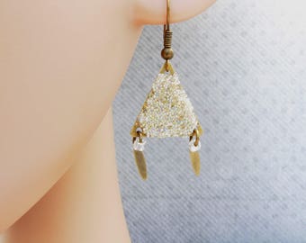 Earrings are made of sparkling