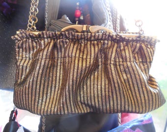 Clutch in black and gold lame with vintage style clasp