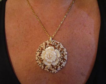 Embroidered beaded pendant