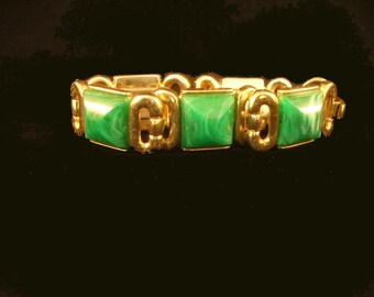 Crown Trifari bracelet, gold tone and green lucite, vintage