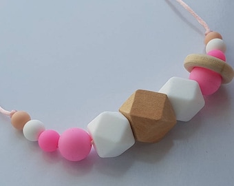 Pink and white hexagonal silicone and wood teething necklace