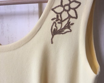 Vintage lemon yellow dress with embroidered daffodil.