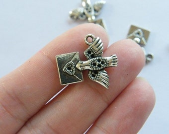 8 Homing pigeon carrying love letter charms antique silver tone B65