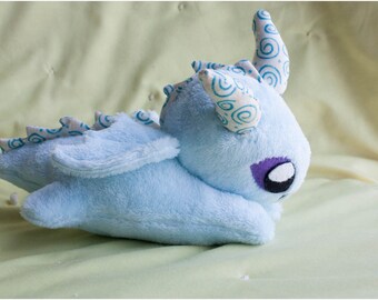 Dragon, stuffed animal, plushie, toy, fantasy creature, snuggle toy, spirals, baby dragon