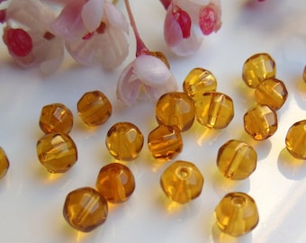 40 beads faceted 5mm yellow Czech glass