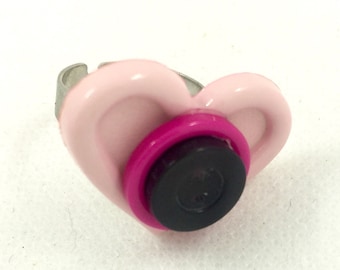 Adjustable silver ring and creative recovery of buttons