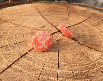 Orange with white floral design fabric button earrings