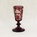 Vintage Bohemian glass cordial, ruby cut to clear stemmed cordial glass with ornate pattern of castle, birds, and trees
