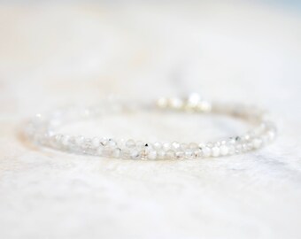 tiny speckled moonstone wrap bracelet. faceted speckled moonstone thin bracelet. thin moonstone wrap bracelet with sterling silver.