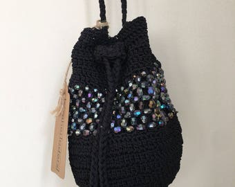 Black crochet crossbody drawstring purse with iridescent beads