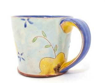 Blue Floral Earthenware mug. Wheel thrown and altered, food safe mug made by Kaitlyn Brennan. This is a big handmade mug perfect for coffee
