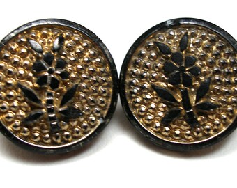 2 Antique GLASS buttons, Victorian flowers on black glass with gold luster. 11/16".