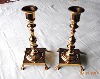 E B Brass a Pair of 7 1/2 inch Candlesticks with Claw Feet