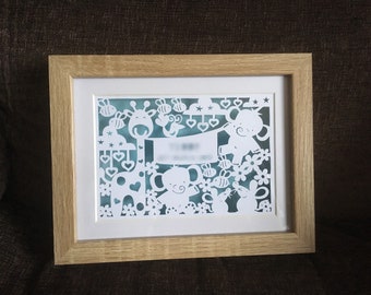 Handcut papercut for a new baby