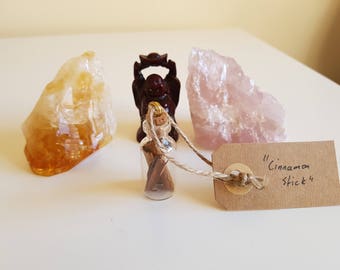 Cinnamon stick, glass bottle,pendant