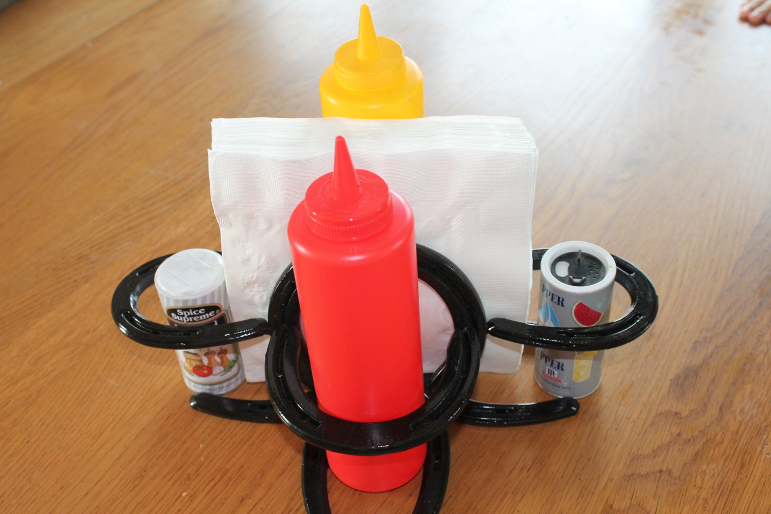 Horseshoe Napkin condiment holder w/ salt and pepper holder.