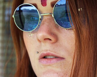 60's 70's round blue lense John Lennon sunglasses with silver or gold frames hippie