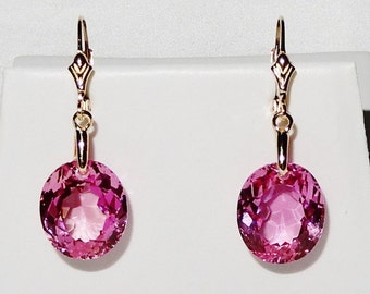 Natural 28cts Oval Pink Topaz gemstones, 14kt yellow gold Leverback Earrings