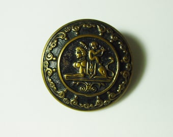 Nice Large Antique Metal Picture Button, Cherub Sitting on A Sphinx, 1 3/8"